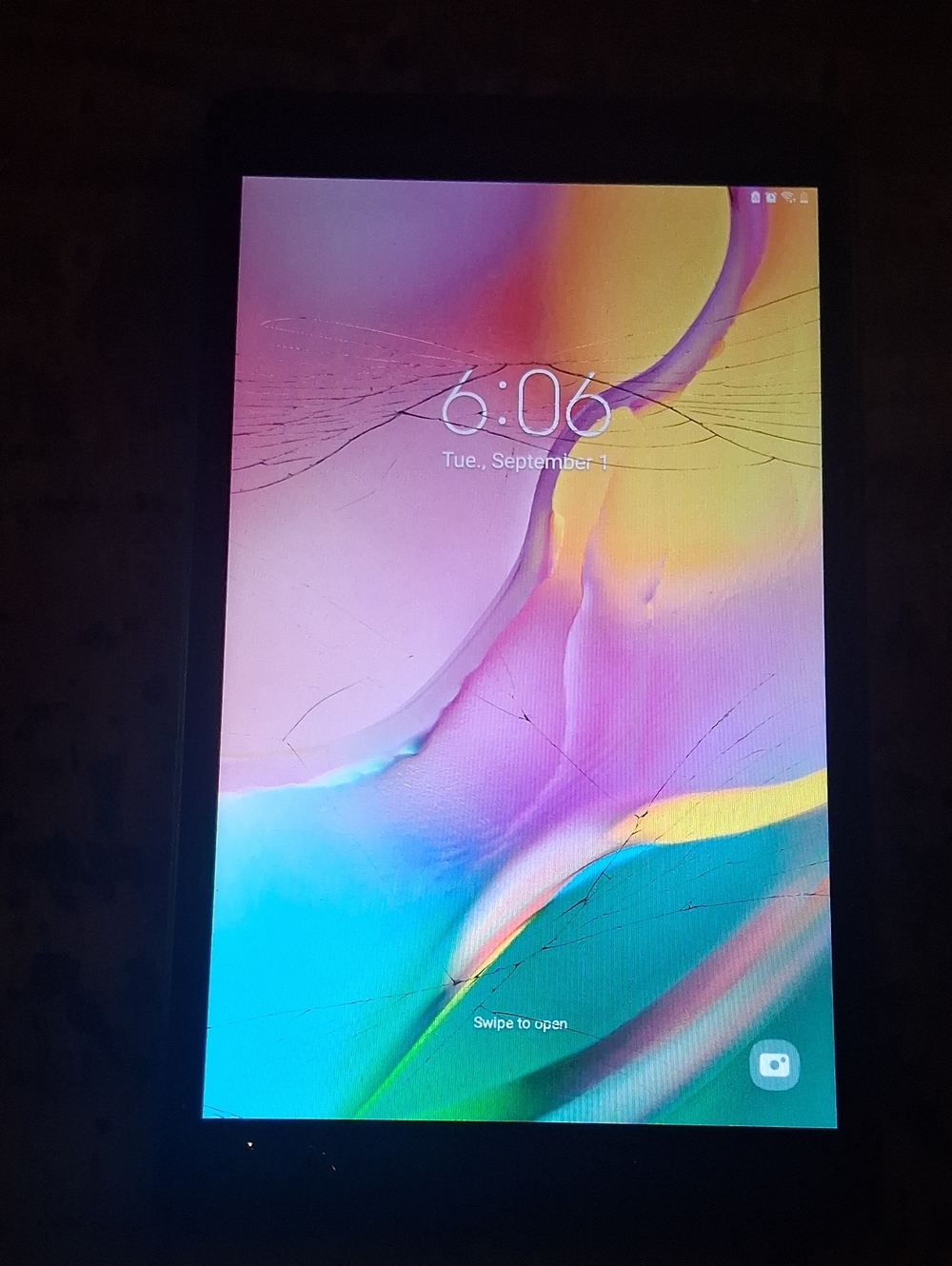 Samsung Tablet with Pink, Blue and Yellow Gradient Display